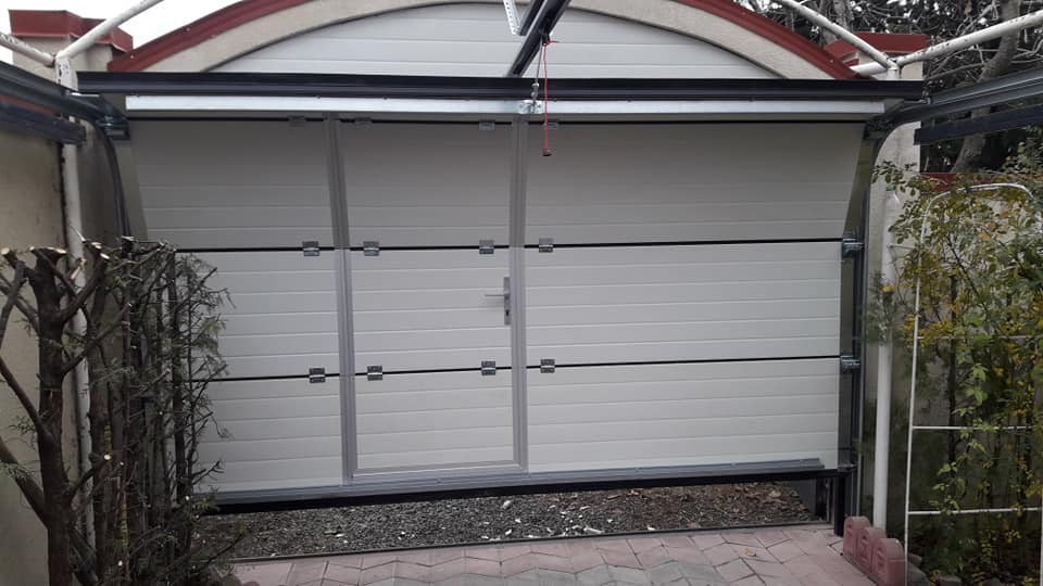 какие ворота выбрать для отапливаемого гаража